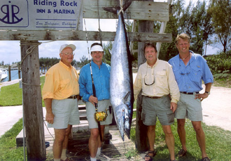Poveromo and crew of the Foxy Lady II with the monster wahoo!